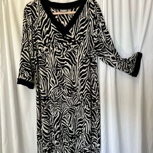 Chico’s Travelers are so great because all wrinkles shake out. Size is 3 .